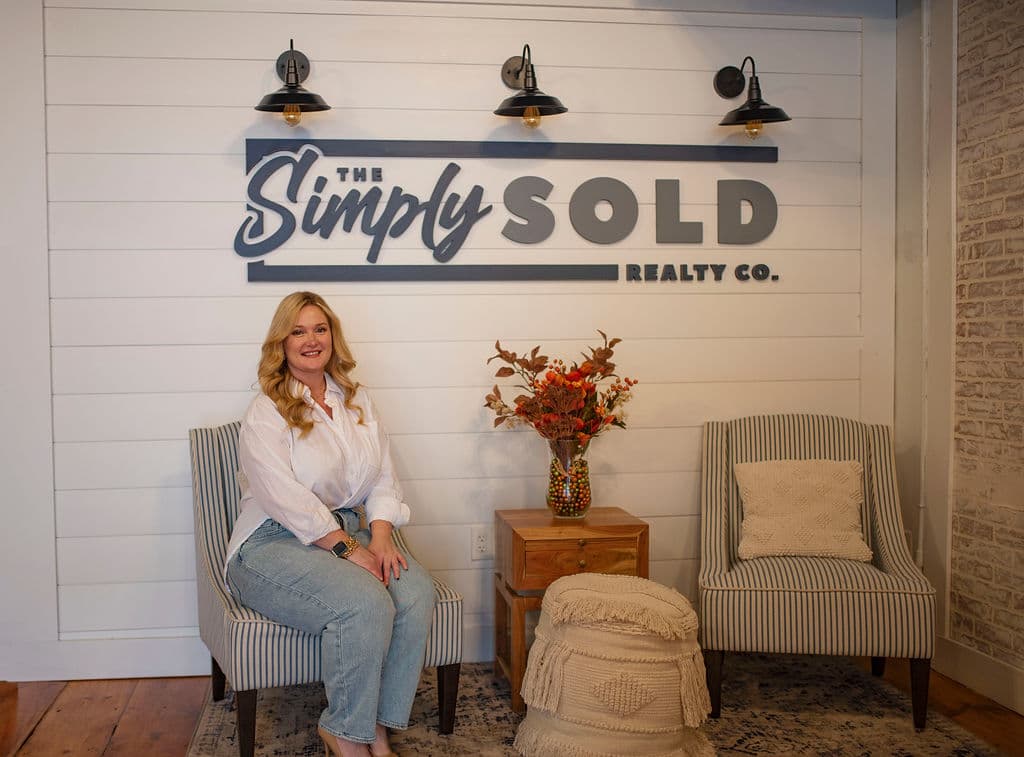 Realtor branding photo in a bright, styled office